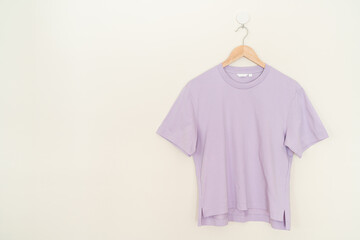 woman t-shirt hanging on wall
