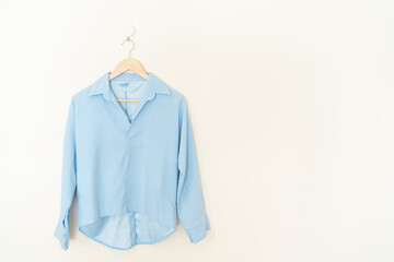 beautiful woman shirt hanging on wall