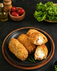 Risol Mayo, Risoles mayo with mozzarella filling, a small patty enclosed in pastry or rolled in bread crumbs. it is filled with smoked beef, mayonnaise, boiled egg and mozzarella cheese. 