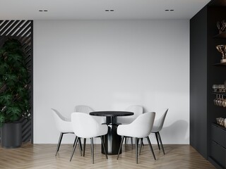 Dining room in black and white monochrome colors. 6 chairs and a round table. Black wall with decor and built-in wardrobe with glasses. Herringbone trendy floor. White mockup background. 3d rendering
