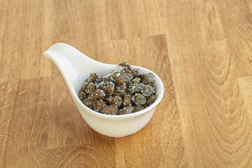 Salted marinated capers snack appetiser