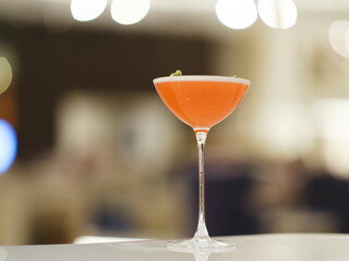 a colorful delicious cocktail in a bar