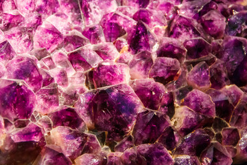 Background texture of purple amethyst gemstone