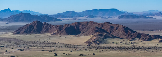 Namibia, aerial view of the Namib desert, wild landscape, panorama in rain season
