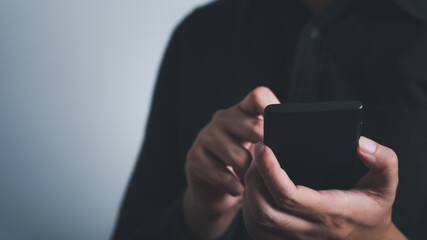 Hands of business man holding and using smartphone. Communication technology concept. online working social network.