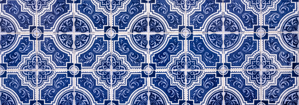     Azulejos in Portugal, detail on a typical house, blue color 
