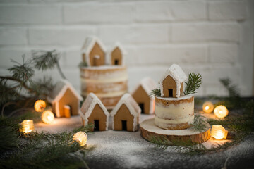 Gingerbread Christmas houses sprinkled with powdered sugar