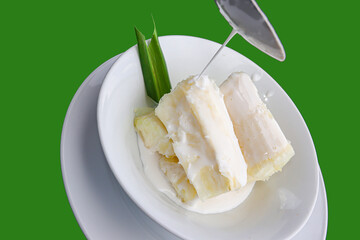 Traditional food steam thai cassava topping with coconut milk and sesame seed