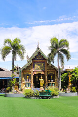 Chapel at  temple of the reclining buddha mother
(PU Kha) in san Kamphaeng , Chiang Mai Thailand on bright blue sky background
