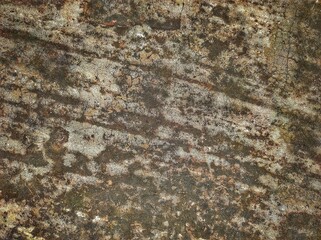 Wall fragment with scratches and cracks.vintage dirty exfoliating plaster Textured background peeling of colour wallpaper cement.The​ pattern​ of​ surface​ wall​ concrete​ for​ background.