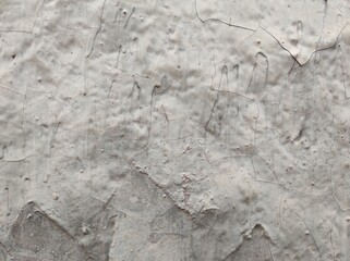 Peeled Texture of old concrete wall for background exposed concrete.Stucco white wall background or texture.Vintage or grungy background of natural cement Wall old texture.Wall fragment with scratch.