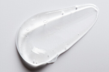 A drop of liquid gel, cosmetic serum or anti-aging lotion.