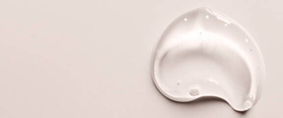 A drop of liquid gel or cosmetic serum or cleansing lotion against acne. Copy space