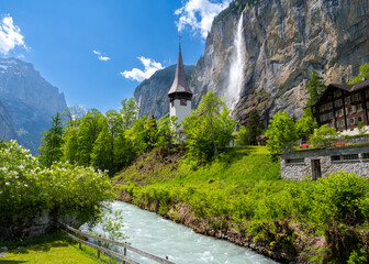 church in alpine village Lauterbrunnen in Switzerland - 519288691