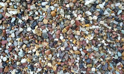 Abstract background with lot of various shape peeble stones. 