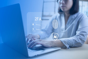 Person using laptop and touching virtual screen for two-factor authentication for safety use of social networks and access to information privacy