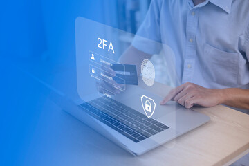 Person using laptop and touching virtual screen for two-factor authentication for safety use of social networks and access to information privacy