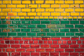 National  flag of the Lithuania  on a grunge brick background.