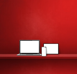 Laptop, mobile phone and digital tablet pc on red wall shelf. Square background