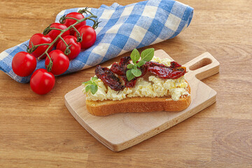 Bruschetta with soft cheese and tomato