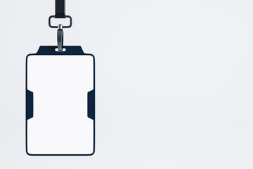 Blank white plastic identification badge with space for your logo or text with black neck strap isolated on empty light background. 3D rendering, mock up