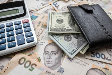Money background purse calculator dollar with hryvnia