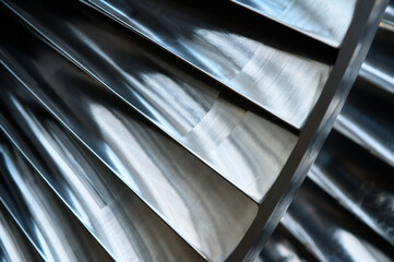Metal blades of high-speed steam turbine in light workshop