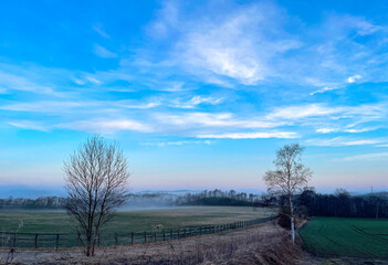 Early spring ranch and refreshing clouds