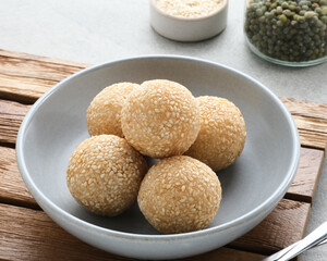 Onde-Onde is traditional food from Indonesia made from glutinous rice flour with beans pasta, wrapped in sesame seeds. Popular Indonesian snack with Chinese influence. 