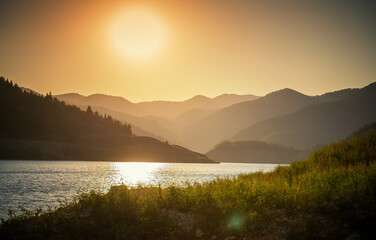 Fototapeta premium View of Zaovine lake in Tara natural park in Serbia at dusk at sunset