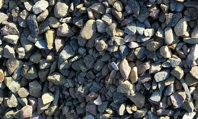 Abstract background with lot of various shape peeble stones. 