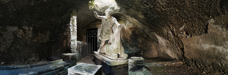 Immersive panoramic view of internal of thermal s mithraeum  with statue of the God Mithras killing a bull