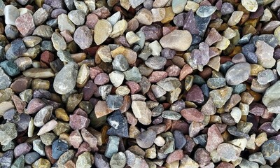 Abstract background with lot of various shape peeble stones. 