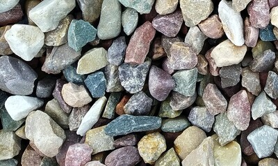 Abstract background with lot of various shape peeble stones. 