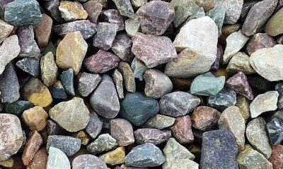 Abstract background with lot of various shape peeble stones. 