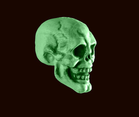Green human skull on black background. Halloween holiday, horror or anatomy concept. High quality photo