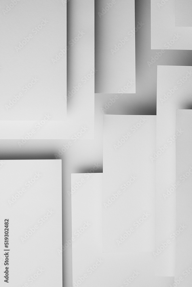 Poster white abstract geometric background with fly white surfaces as monochrome stylish pattern with verti