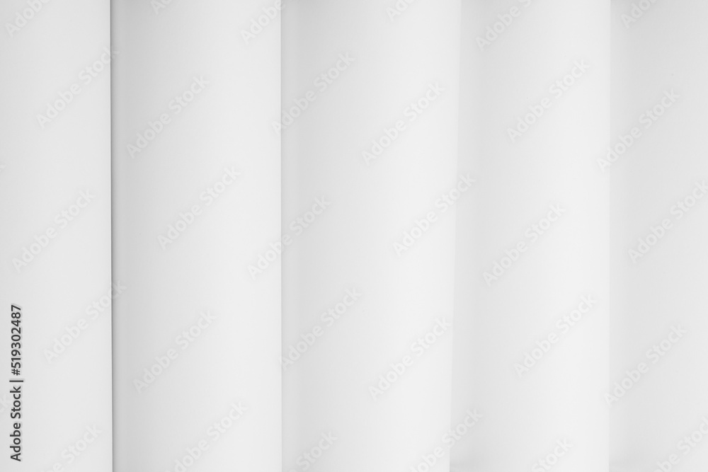 Poster white abstract geometric background with soft light smooth vertical parallel stripes or tubes as pat