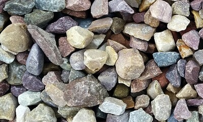 Abstract background with lot of various shape peeble stones. 
