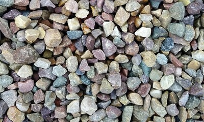 Abstract background with lot of various shape peeble stones. 