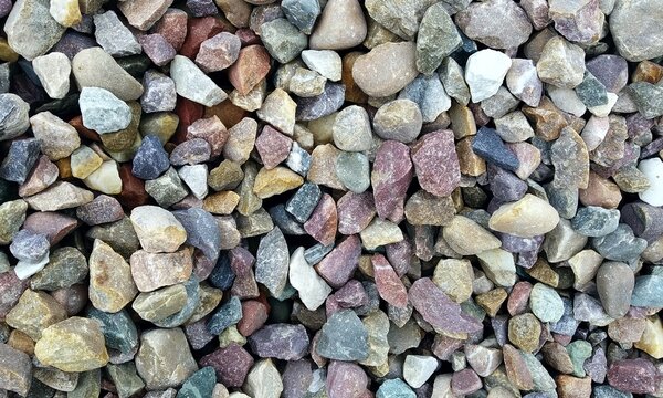 Abstract background with lot of various shape peeble stones. 