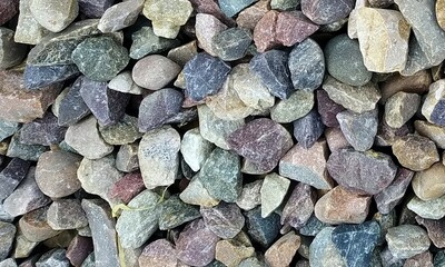 Abstract background with lot of various shape peeble stones. 