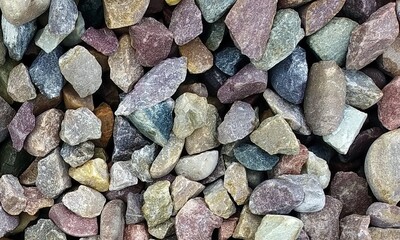 Abstract background with lot of various shape peeble stones. 