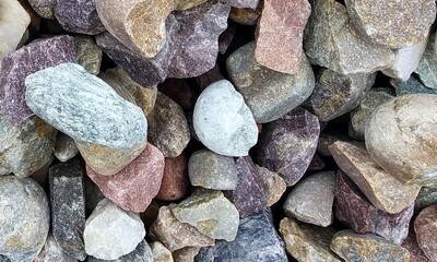 Abstract background with lot of various shape peeble stones. 