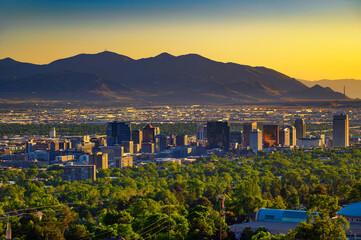 Salt Lake City skyline at sunset with Wasatch Mountains in the background, Utah