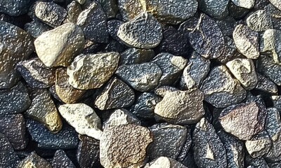 Abstract background with lot of various shape peeble stones. 