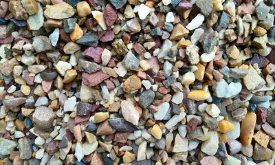 Abstract background with lot of various shape peeble stones. 