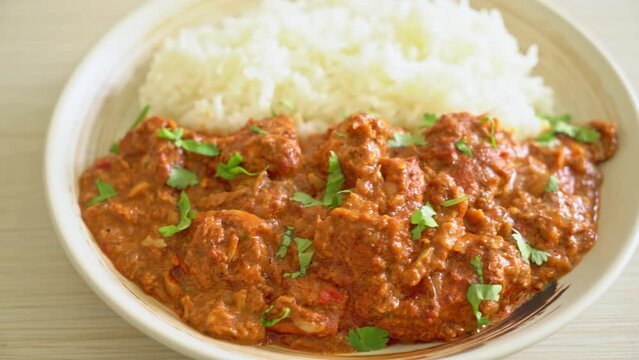 chicken tikka masala with rice on plate - Indian food style