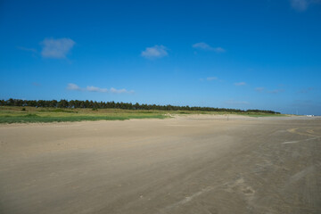 Empty sandy  beach on the north sea, windy weather