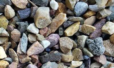 Abstract background with lot of various shape peeble stones. 